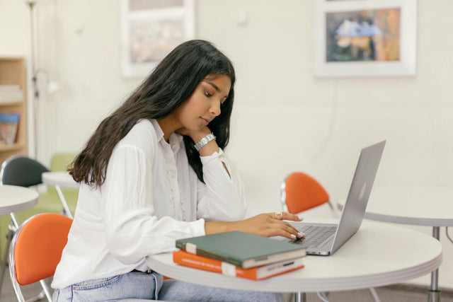 woman learning about UTI (Urinary Tract Infection) Symptoms and Medicine