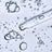 Glass dropper resting in clear gel dotted with air bubbles, representing hyaluronic acid.